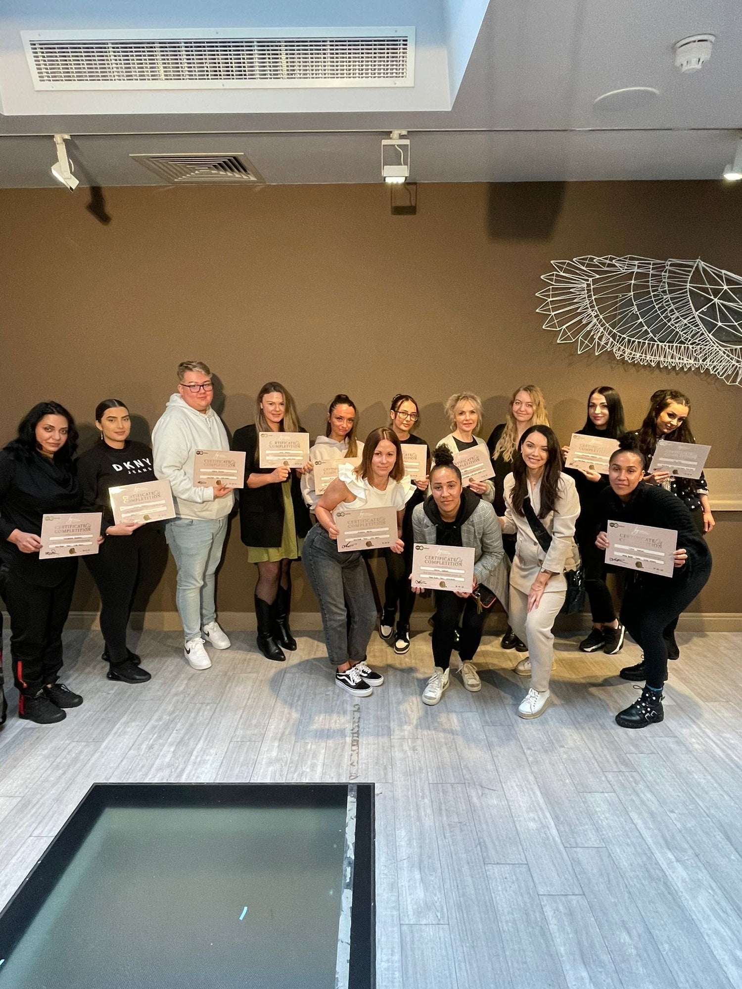 Group of hair extension students after accreditation