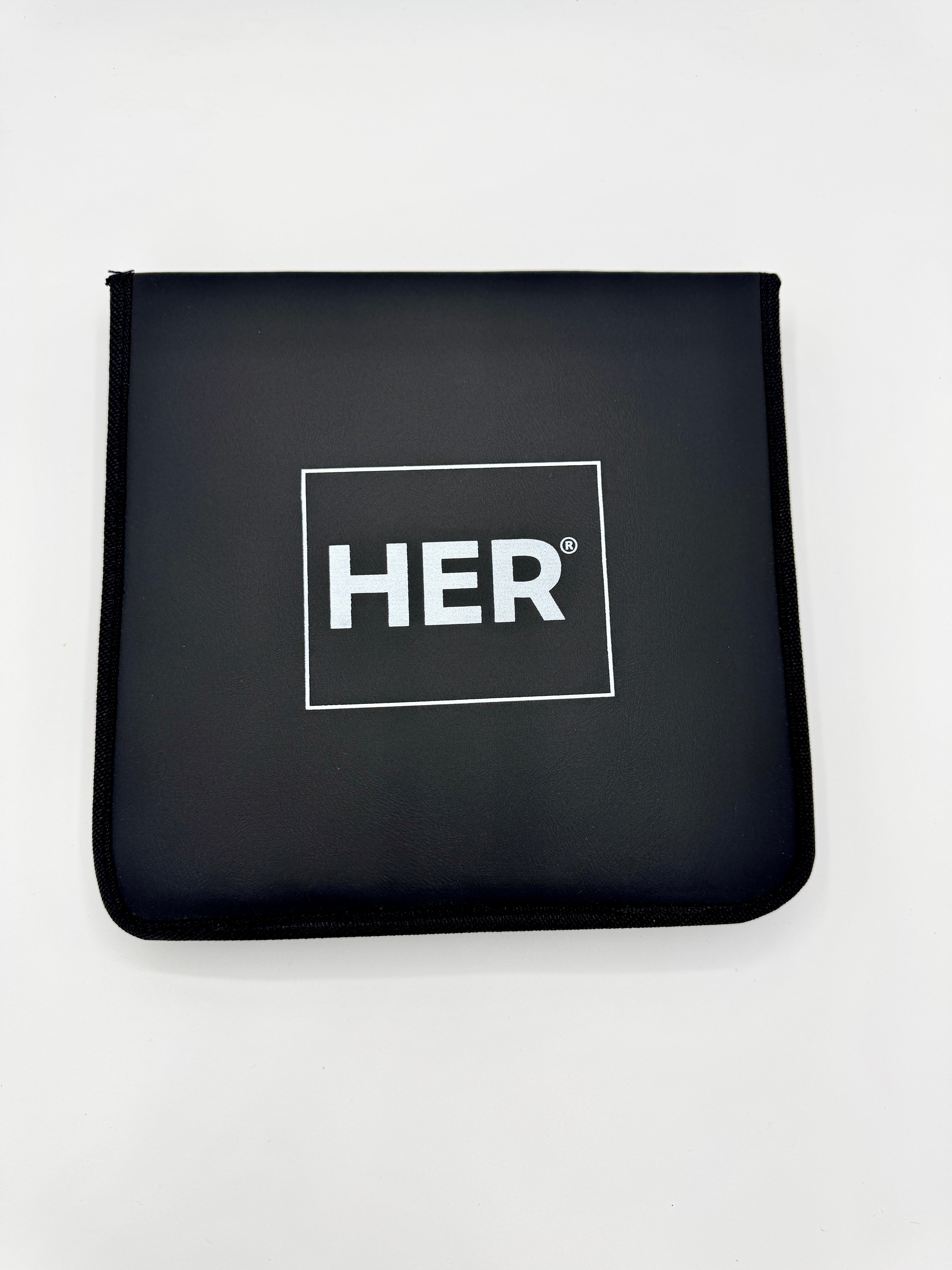 Black pouch with 'HER' logo on a white background